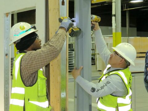 Adolfson & Peterson carpenters learn frame installation from Doorways' experts