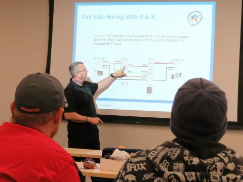 Roger Schmidt from ASSA ABLOY instructs technicians on fail safe lock wiring.