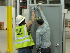 Adolfson & Peterson Construction carpenters learn door, frame and hardware installation from Doorways’ experts.